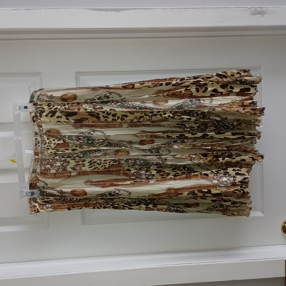 Skirt by ALBERTO MIKALI,  beige print.